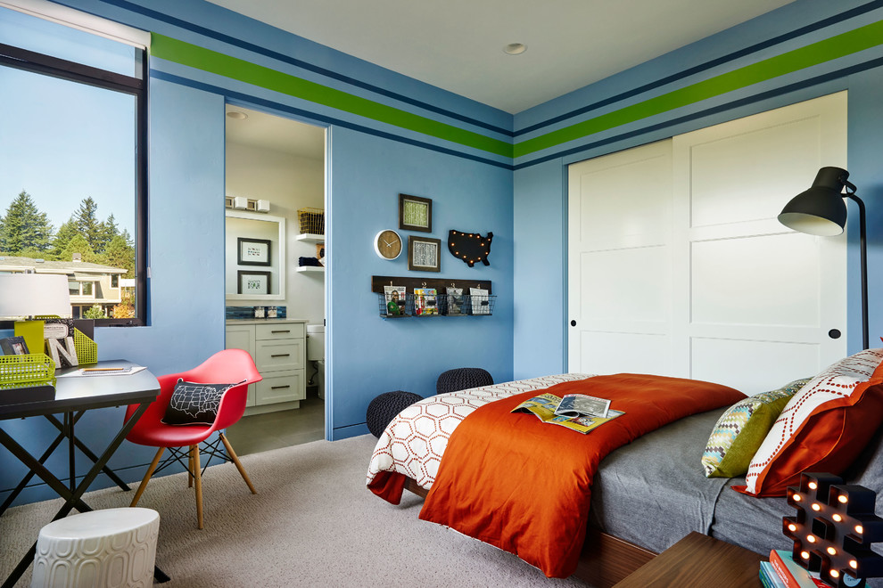Inspiration for a contemporary gender-neutral carpeted kids' room remodel in Portland with multicolored walls