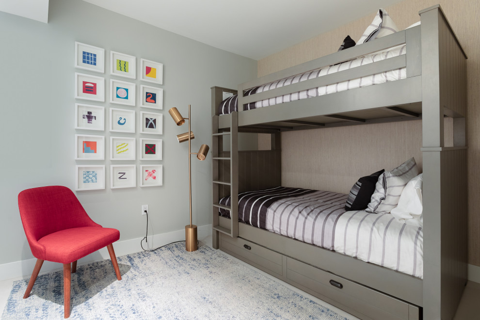 Exemple d'une chambre d'enfant tendance avec un lit superposé.