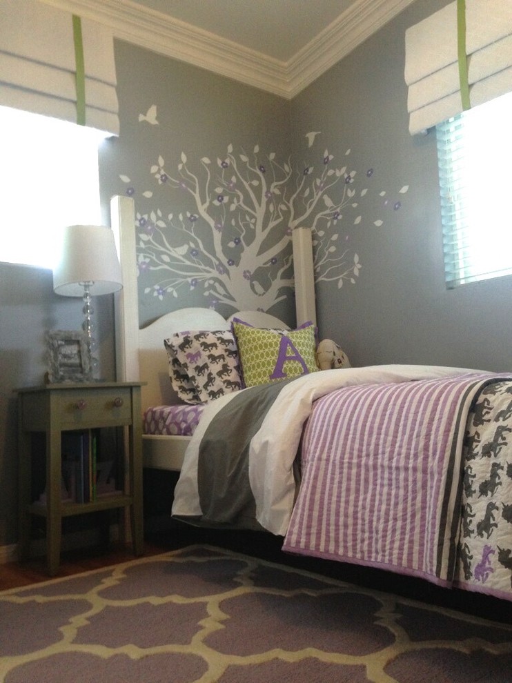 Transitional girl kids' room photo in San Diego with gray walls