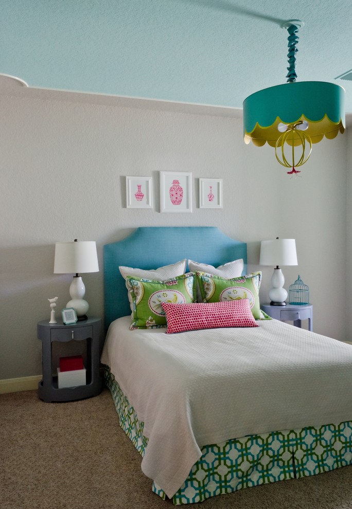 Inspiration for a contemporary girl carpeted and beige floor kids' room remodel in Austin with gray walls