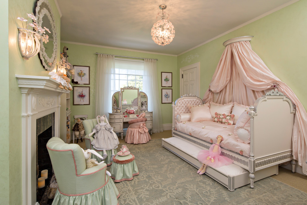 This is an example of a victorian kids' bedroom for girls in New York with green walls and carpet.