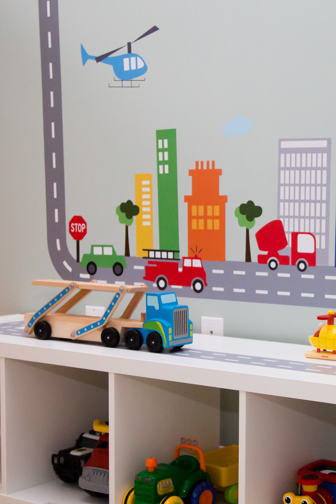 Réalisation d'une chambre d'enfant de 1 à 3 ans minimaliste de taille moyenne avec un mur gris et moquette.