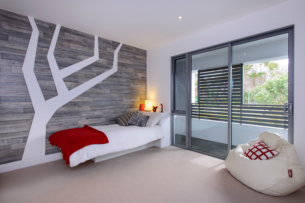 Inspiration for a contemporary beige floor kids' bedroom remodel in Sydney