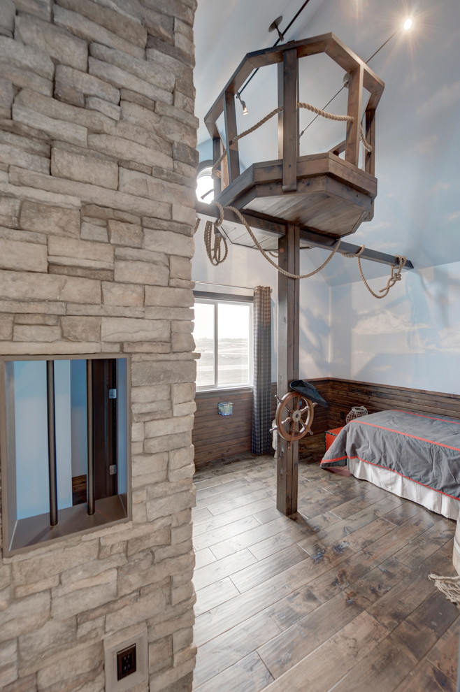Example of an eclectic boy medium tone wood floor playroom design in Edmonton