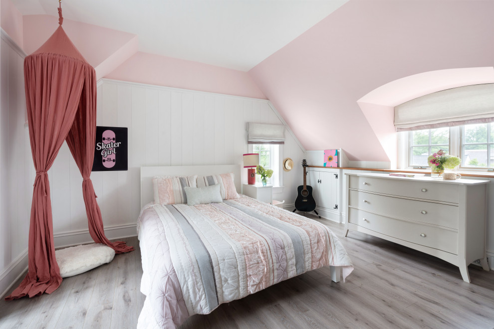 Inspiration for a classic kids' bedroom for girls in Philadelphia with pink walls, light hardwood flooring, grey floors and tongue and groove walls.