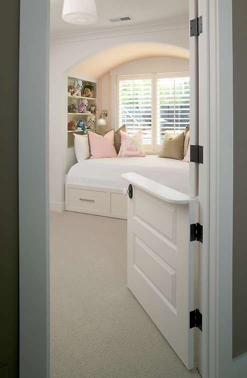 Inspiration for a large transitional carpeted kids' bedroom remodel in Grand Rapids with beige walls