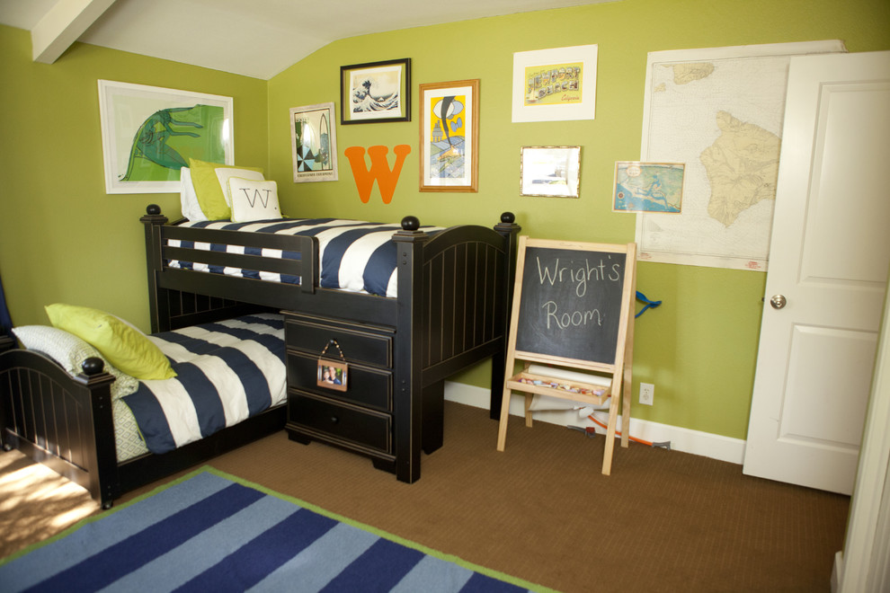 Photo of a medium sized contemporary toddler’s room for boys in Orange County with green walls and carpet.