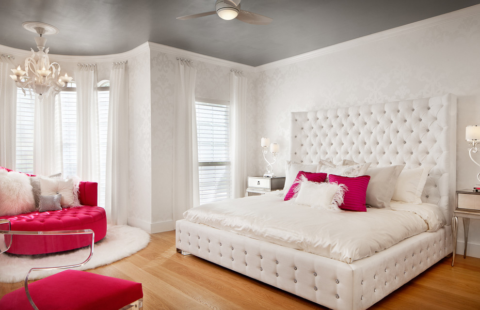 Photo of a large contemporary teen’s room for girls in Austin with white walls and medium hardwood flooring.
