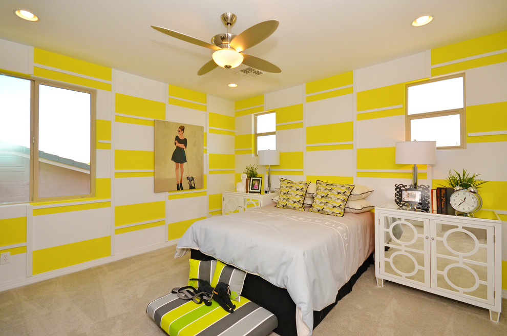 This is an example of a medium sized contemporary teen’s room for girls in Phoenix with carpet and multi-coloured walls.