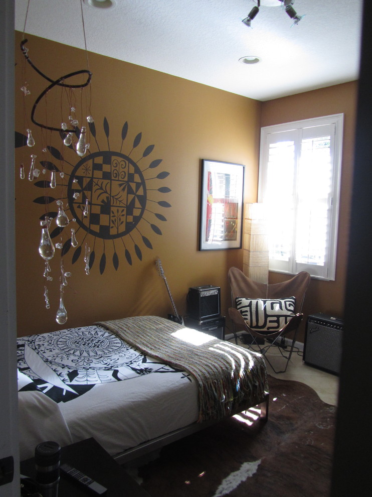 Eclectic gender neutral teen’s room in Other with brown walls.