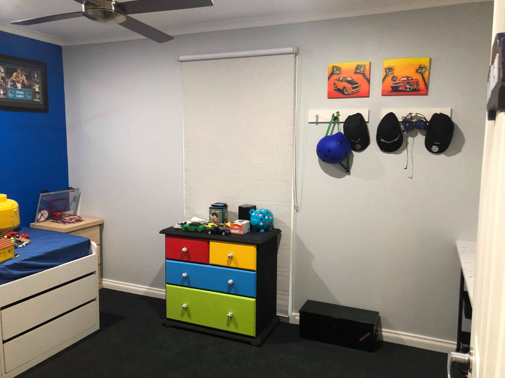 Inspiration for a medium sized contemporary children’s room for boys in Melbourne with grey walls, carpet and grey floors.