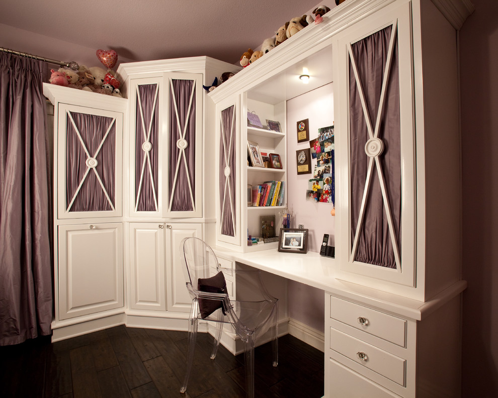 Example of a classic girl dark wood floor kids' room design in Las Vegas with beige walls