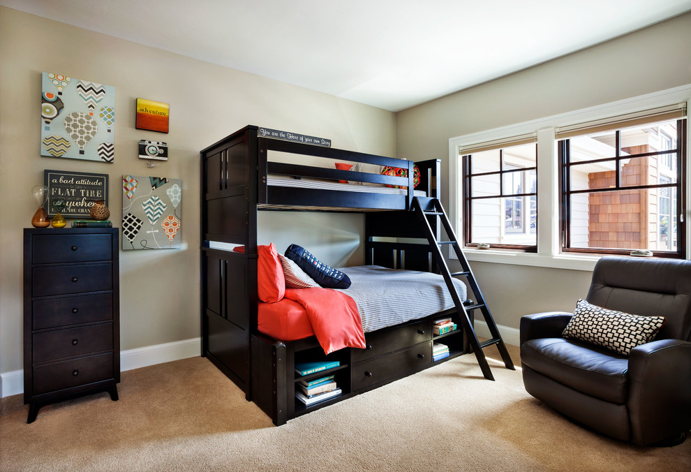 Photo of a large classic children’s room for boys in Portland with beige walls, carpet and beige floors.