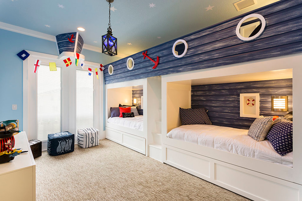 На фото: детская в морском стиле с спальным местом, синими стенами, ковровым покрытием и бежевым полом для ребенка от 4 до 10 лет, мальчика