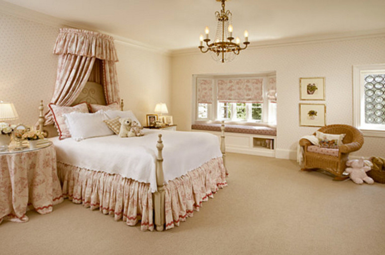 Medium sized traditional children’s room for girls in New York with beige walls, carpet and beige floors.