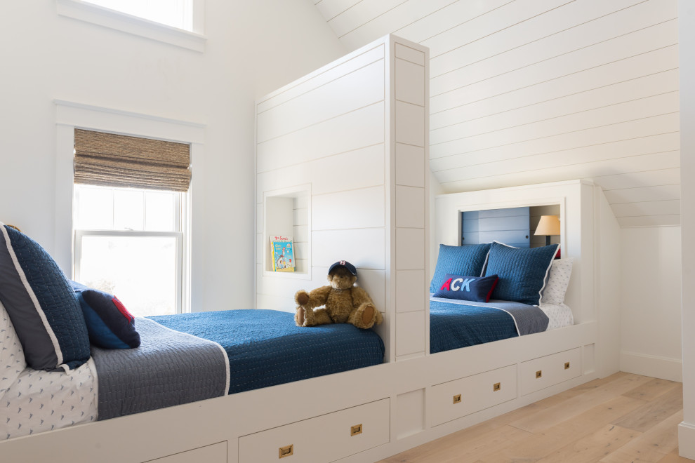 Photo of a beach style kids' bedroom in Boston.