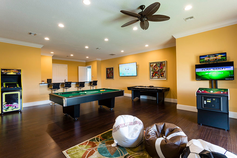 Example of a huge transitional gender-neutral dark wood floor kids' room design in Orlando with yellow walls