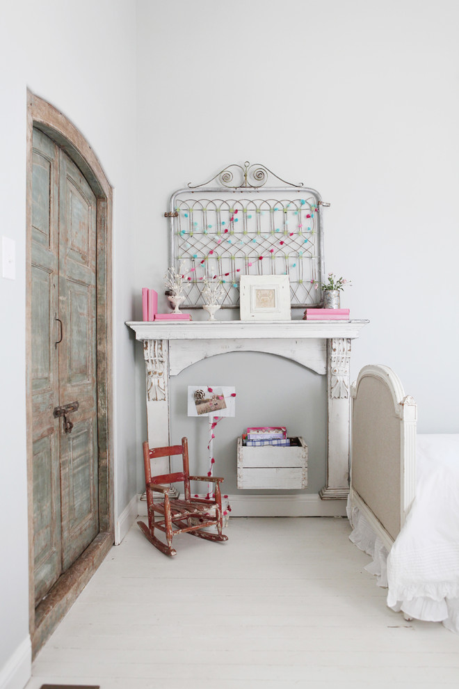 Inspiration for a small farmhouse girl painted wood floor kids' room remodel in Austin with gray walls
