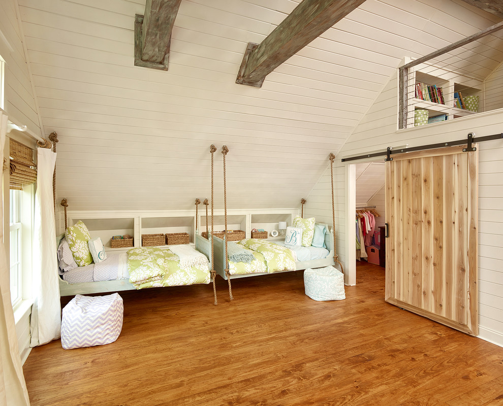 Inspiration for a large beach style kids' bedroom in Charleston with white walls and medium hardwood flooring.