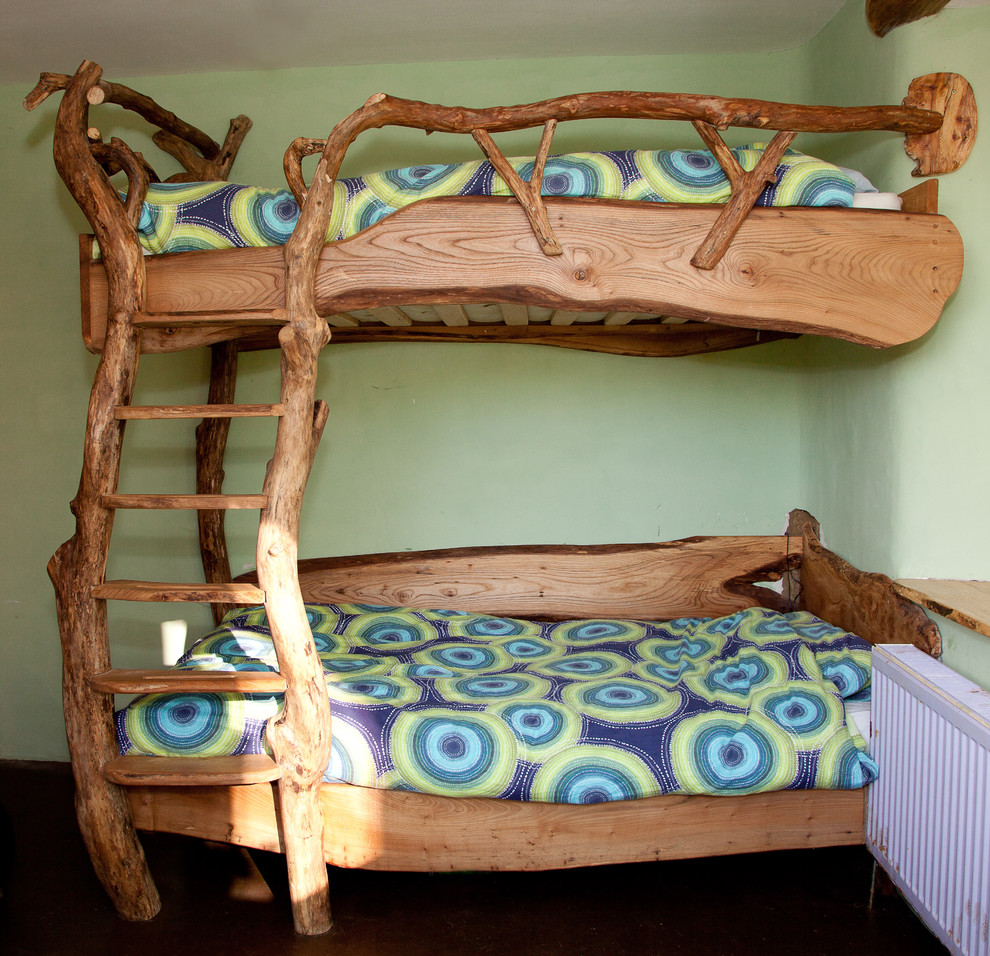 Example of an eclectic kids' room design in Other