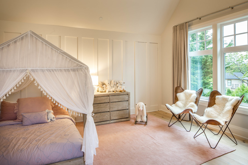 Design ideas for a classic kids' bedroom in Vancouver with white walls, light hardwood flooring and beige floors.