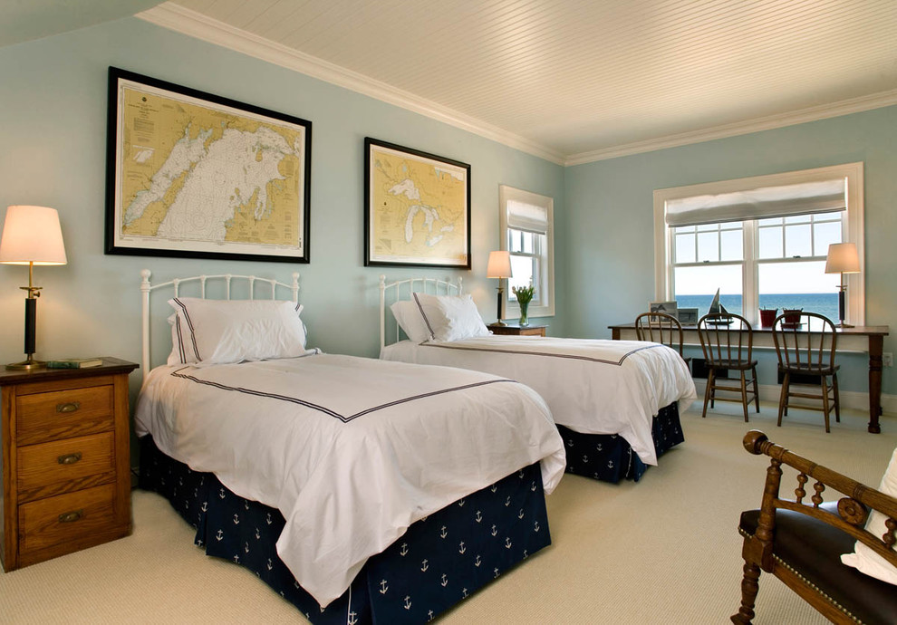 Immagine di una cameretta per bambini da 4 a 10 anni stile marino di medie dimensioni con pareti blu, moquette e pavimento beige
