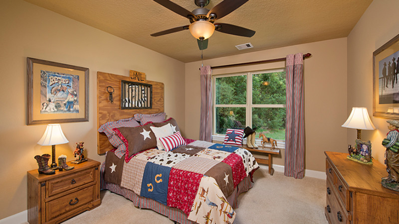 Inspiration for a medium sized rustic children’s room for boys in Houston with beige walls, carpet and beige floors.