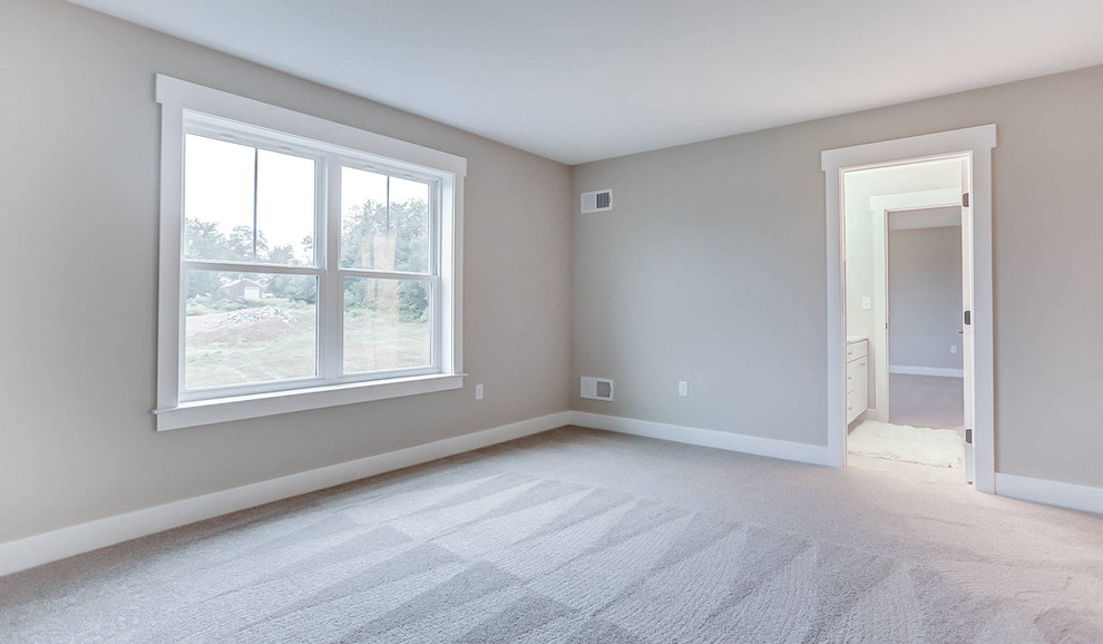 Ejemplo de dormitorio infantil campestre grande con paredes grises, moqueta y suelo beige