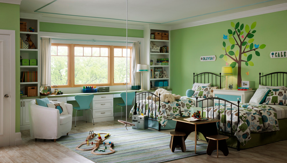 Inspiration for a medium sized traditional gender neutral children’s room in Seattle with green walls and light hardwood flooring.