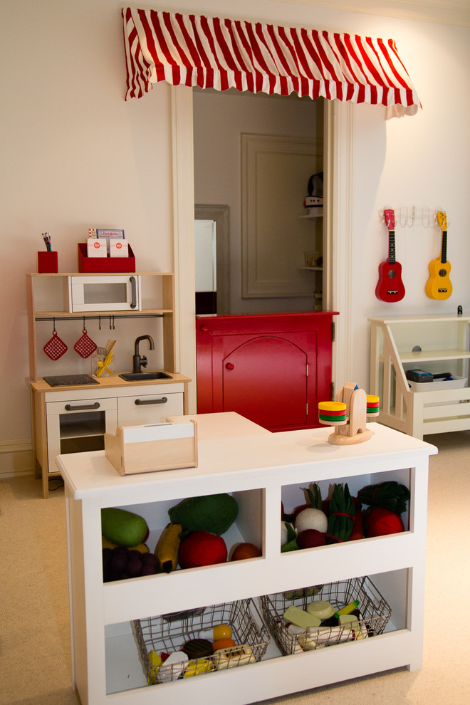 Inspiration for a timeless gender-neutral carpeted playroom remodel in New York