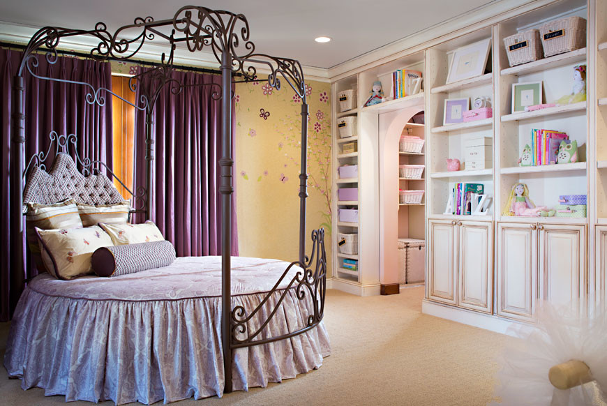 Kids' room - large traditional girl carpeted kids' room idea in San Diego with multicolored walls