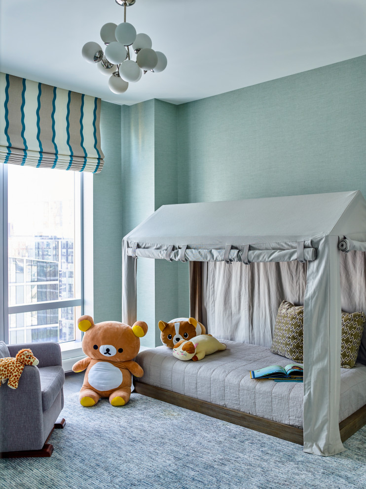 Design ideas for a classic kids' bedroom in New York with blue walls, carpet and grey floors.