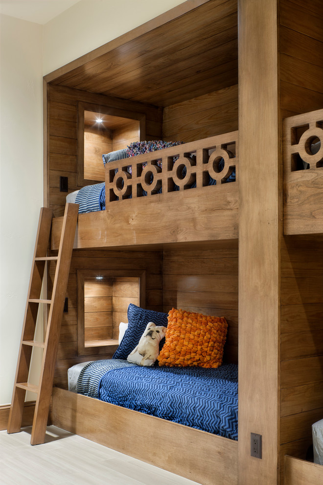 Example of a transitional gender-neutral beige floor kids' bedroom design in Austin