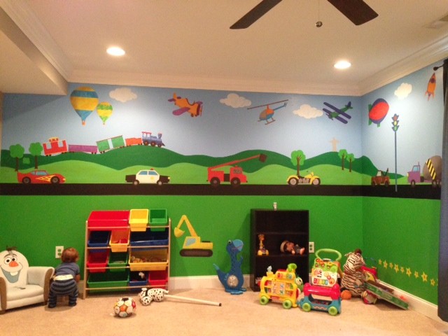 Réalisation d'une très grande chambre d'enfant de 1 à 3 ans design avec un mur vert.
