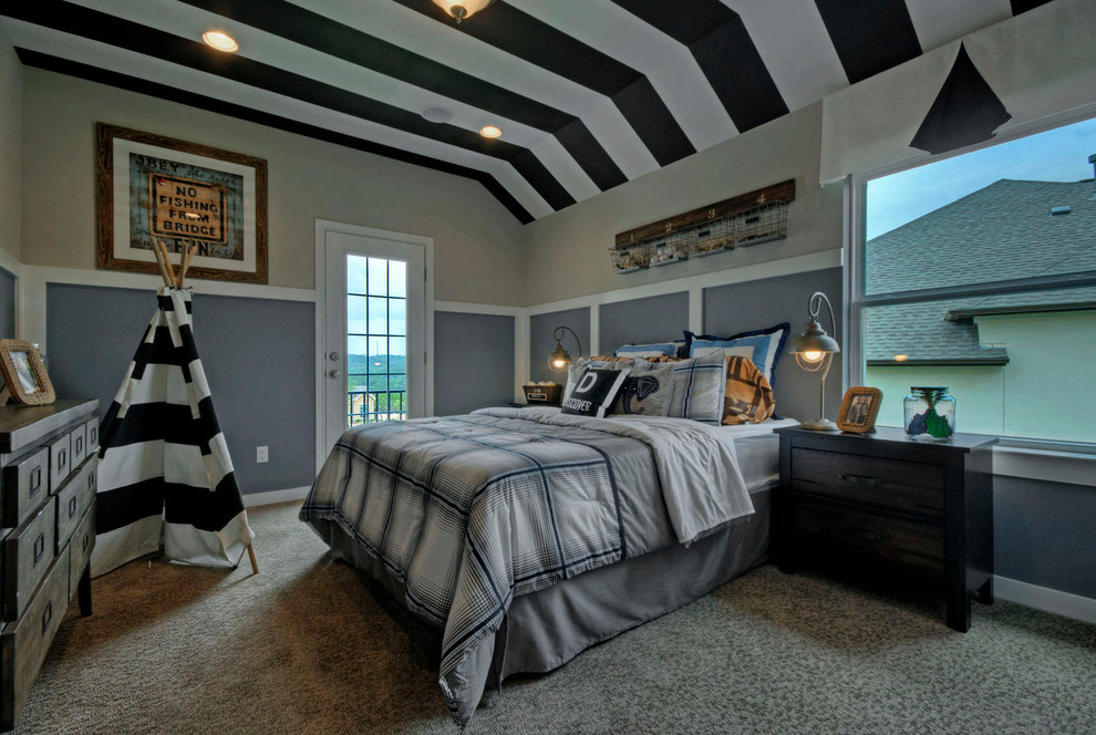Example of a mid-sized transitional boy carpeted childrens' room design in Austin with gray walls