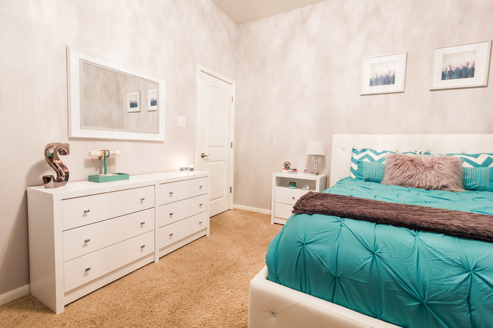 Inspiration for a medium sized modern teen’s room for girls in Austin with white walls and carpet.