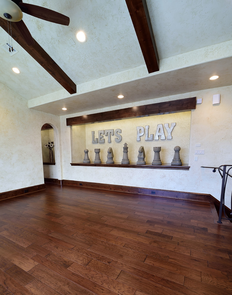 Large tuscan gender-neutral medium tone wood floor and brown floor playroom photo in Houston with beige walls