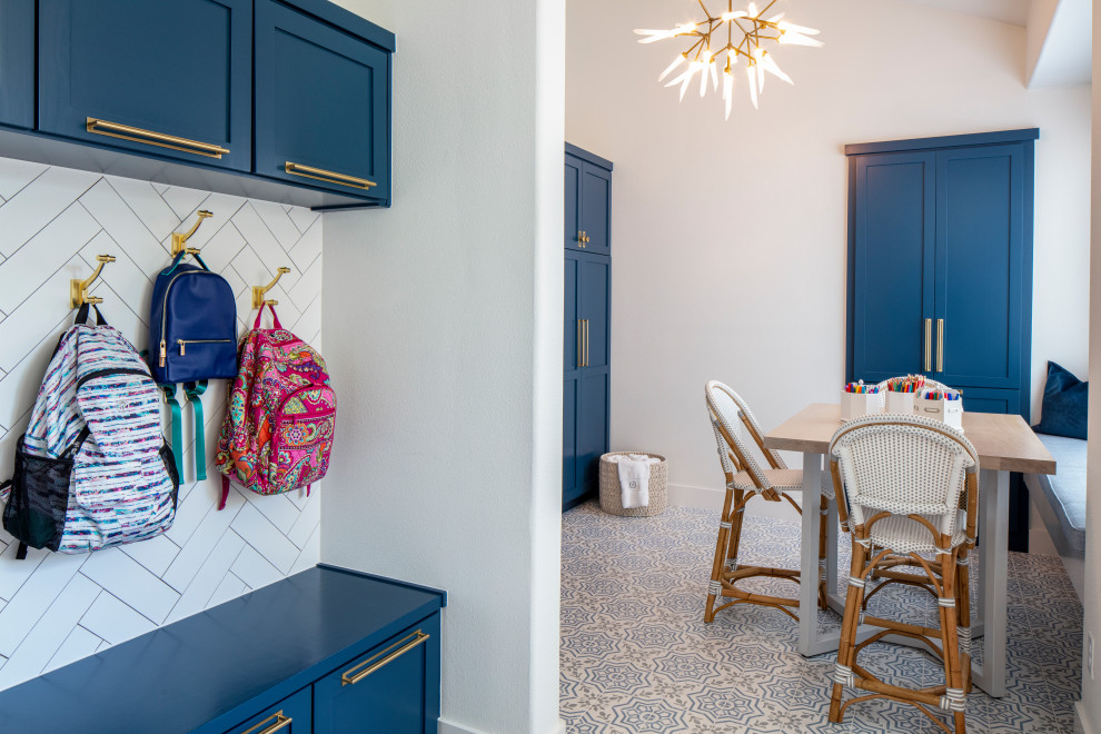 This is an example of a medium sized classic gender neutral kids' bedroom in Austin with white walls, ceramic flooring and blue floors.