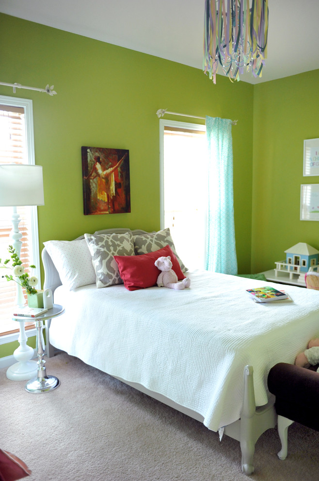 Eclectic kids' bedroom for girls in Birmingham with green walls.