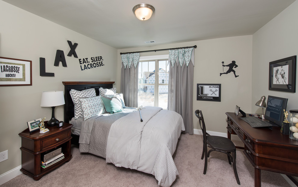 This is an example of a large traditional kids' bedroom for boys in Raleigh with grey walls and carpet.