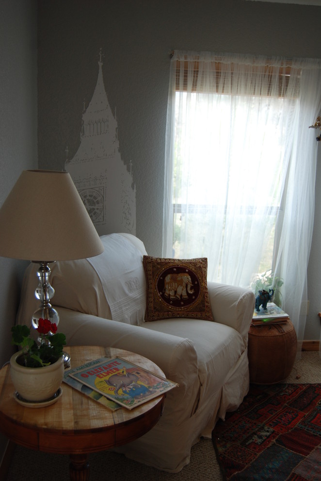 This is an example of a bohemian kids' bedroom in Other.
