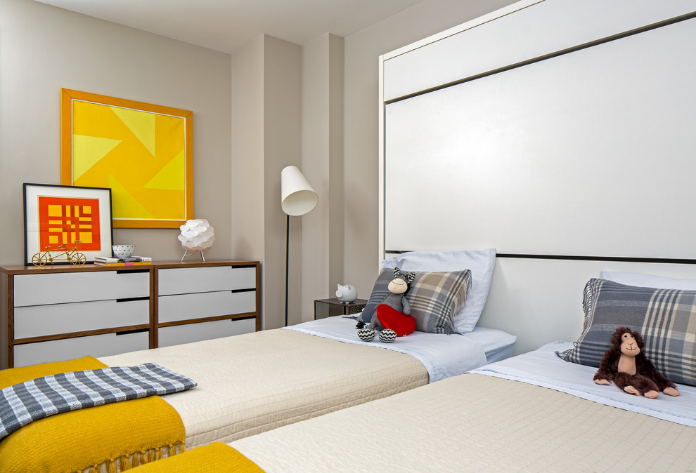 Exemple d'une chambre d'enfant rétro avec un mur beige.