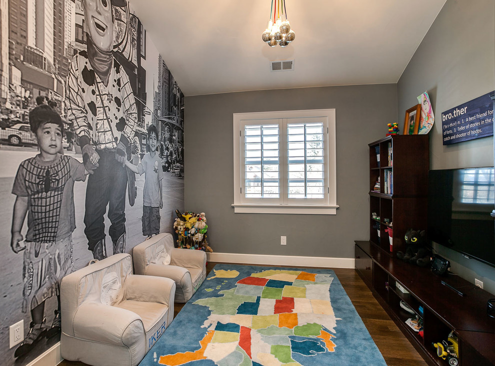Example of a mid-sized transitional gender-neutral dark wood floor and brown floor playroom design in Denver with gray walls