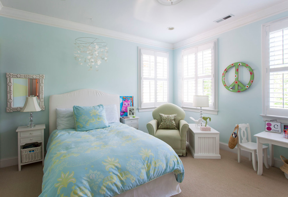 Photo of a medium sized contemporary kids' bedroom for girls in Charlotte with blue walls and carpet.