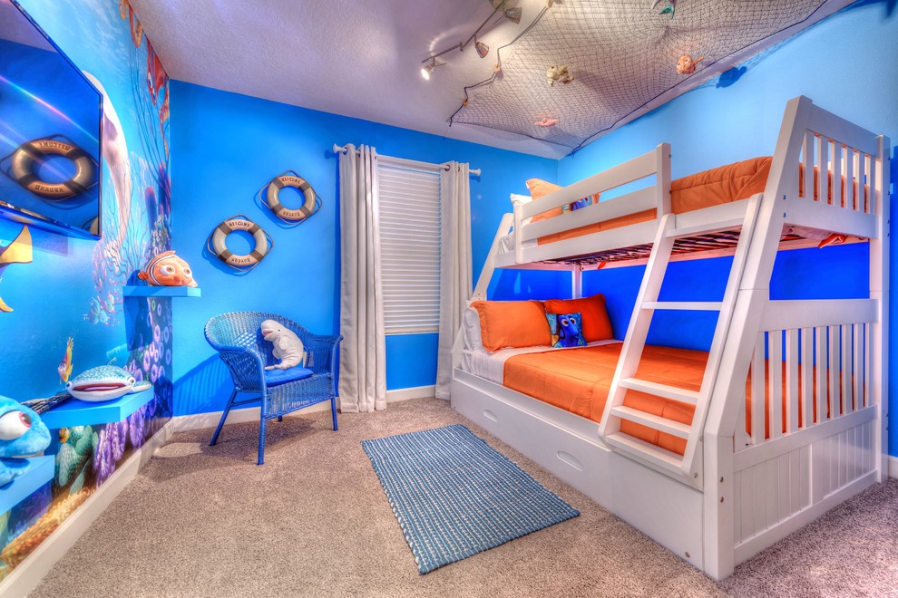 Design ideas for a contemporary gender neutral children’s room in Orlando with blue walls, carpet and beige floors.