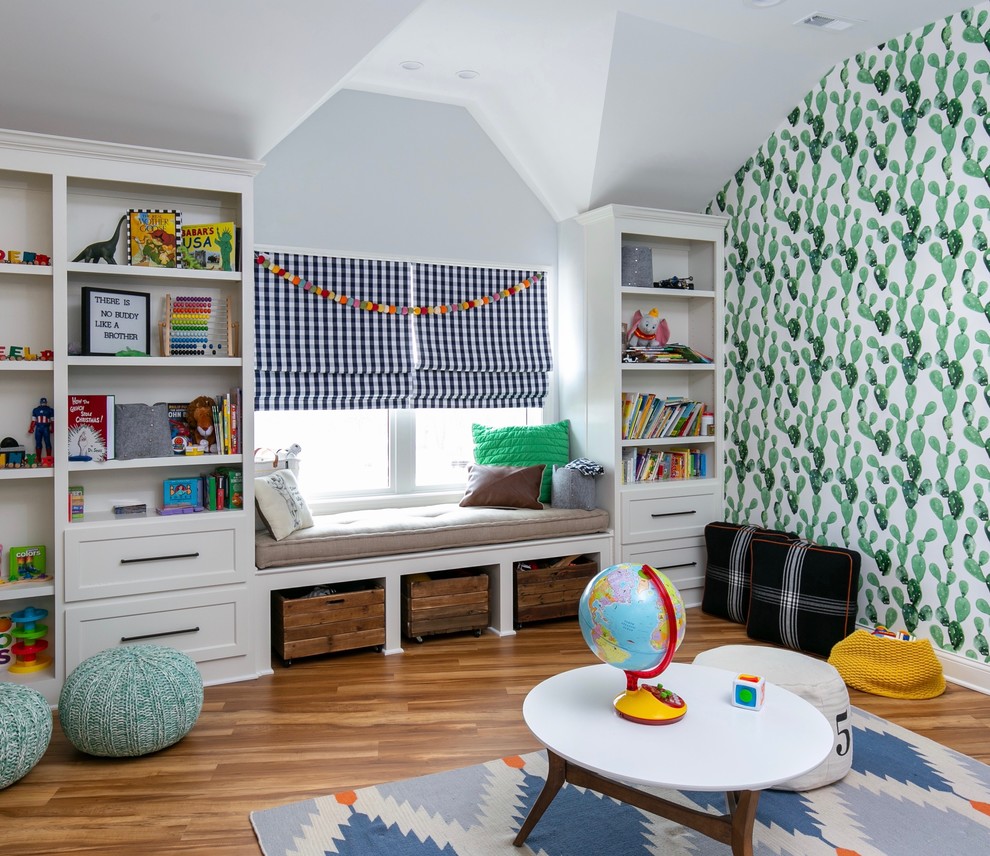 This is an example of a large classic gender neutral playroom in Kansas City with blue walls, laminate floors, brown floors and a feature wall.