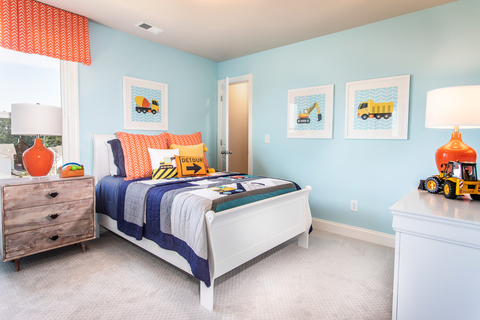 Idée de décoration pour une chambre d'enfant de 4 à 10 ans design de taille moyenne avec un mur bleu, moquette et un sol gris.