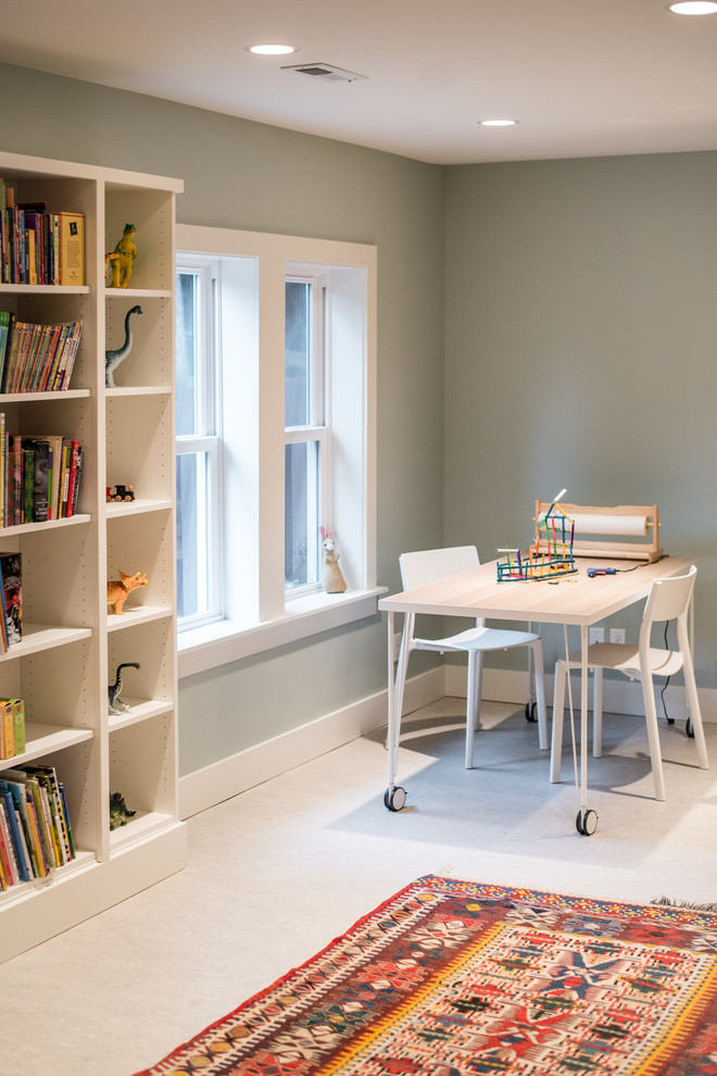 Arts and crafts gender-neutral white floor kids' room photo in Seattle with green walls