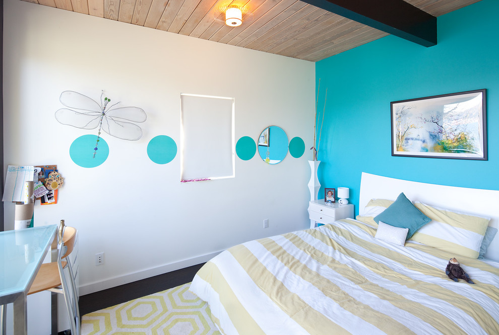 Midcentury kids' bedroom in Seattle with blue walls.