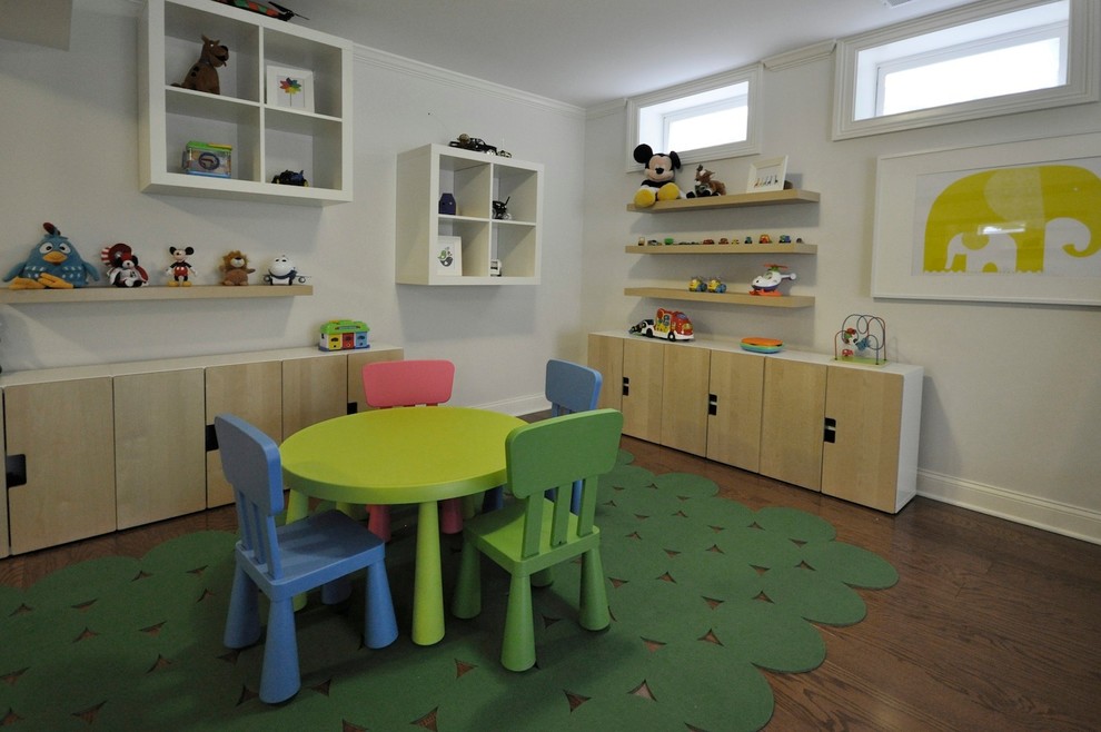 Example of a large minimalist gender-neutral kids' room design in New York
